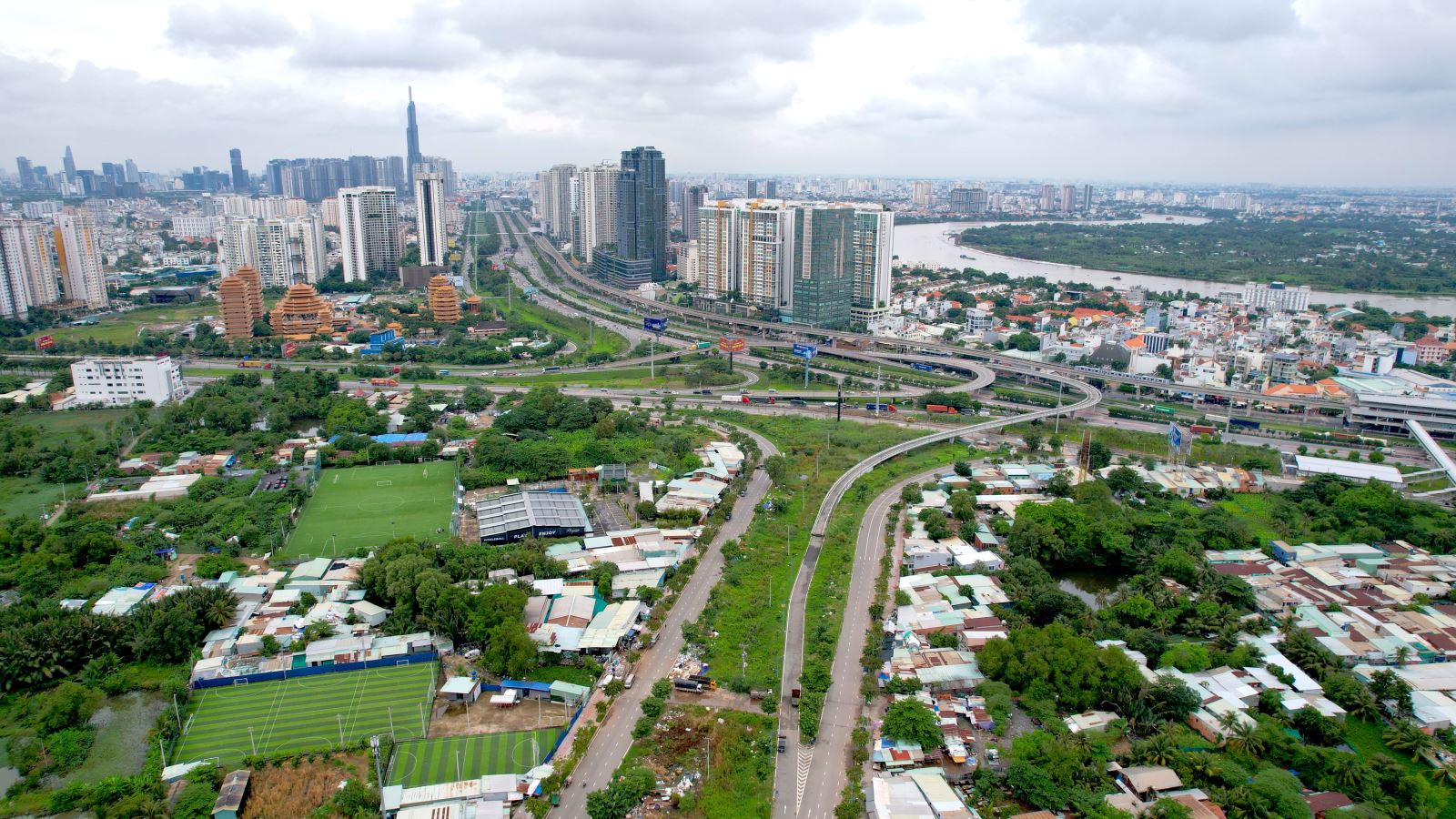 An aerial view of a road and buildingsAI-generated content may be incorrect.